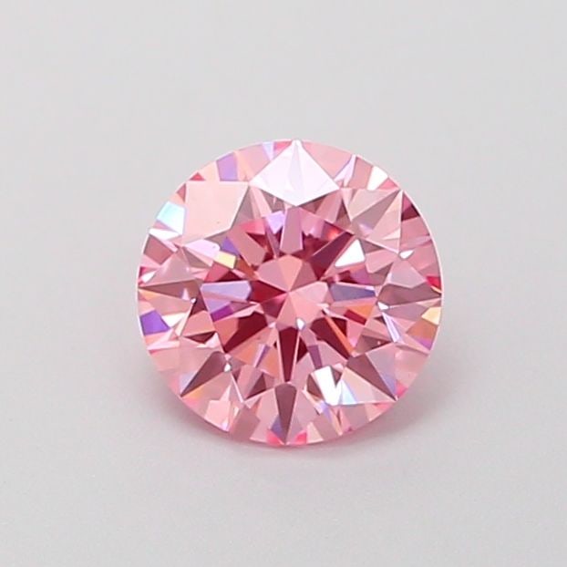 Ideal Loose Diamond - ROUND 0.56ct Fancy Vivid Pink VS1: Ideal Loose Diamond - ROUND 0.56ct Fancy Vivid Pink VS1 Source: This is a real non-mined Diamond that has been grown in a lab Shape: ROUND Carats: 0.56 Color: Fancy Vivid Pink Certification: IGI Video