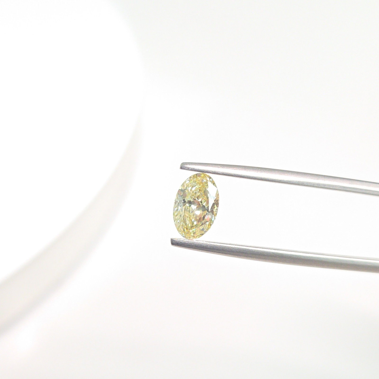 Loose Diamond - OVAL 1.02ct Fancy Yellow VS2: Loose Diamond - OVAL 1.02ct Fancy Yellow VS2 Source: This is a real non-mined Diamond that has been grown in a lab Shape: OVAL Carats: 1.02 Color: Fancy Yellow Certification: IGI Video: