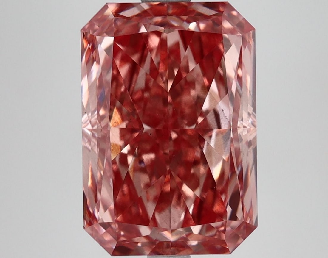 Loose Diamond - RADIANT 5.24ct Fancy Vivid Pink VS2: Loose Diamond - RADIANT 5.24ct Fancy Vivid Pink VS2 Source: This is a real non-mined Diamond that has been grown in a lab Shape: RADIANT Carats: 5.24 Color: Fancy Vivid Pink Certification: IGI Video: