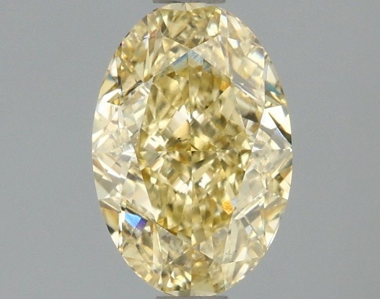 Loose Diamond - OVAL 1.54ct Fancy Intense Yellow VS1: Loose Diamond - OVAL 1.54ct Fancy Intense Yellow VS1 Source: This is a real non-mined Diamond that has been grown in a lab Shape: OVAL Carats: 1.54 Color: Fancy Intense Yellow Certification: IGI Video