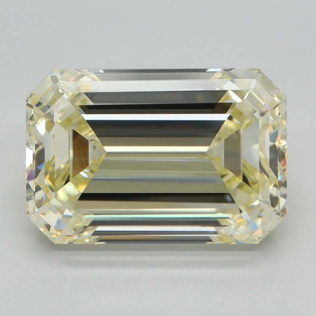Loose Diamond - EMERALD 5.1ct Fancy Light Yellow VS1: Loose Diamond - EMERALD 5.1ct Fancy Light Yellow VS1 Source: This is a real non-mined Diamond that has been grown in a lab Shape: EMERALD Carats: 5.1 Color: Fancy Light Yellow Certification: IGI Video