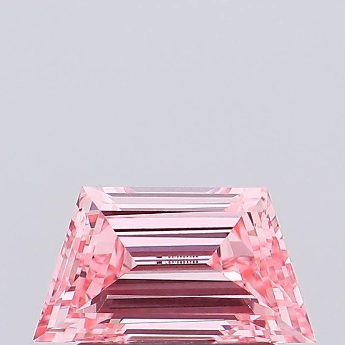 Loose Diamond - TRAPEZOID 0.8ct Fancy Vivid Pink VVS2: Loose Diamond - TRAPEZOID 0.8ct Fancy Vivid Pink VVS2 Source: This is a real non-mined Diamond that has been grown in a lab Shape: TRAPEZOID Carats: 0.8 Color: Fancy Vivid Pink Certification: IGI Vide