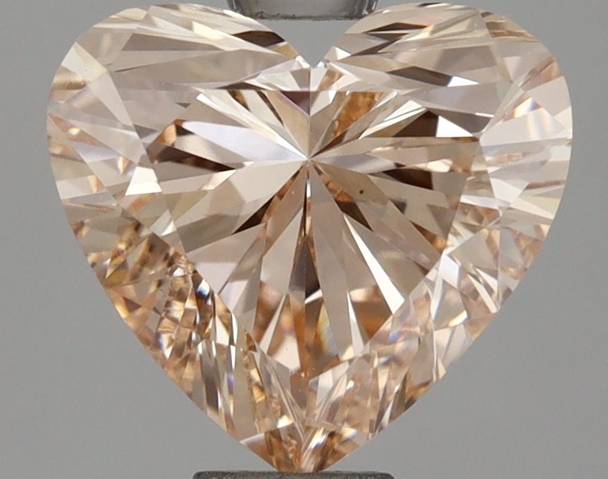 Loose Diamond - HEART 1.6ct Fancy Brown Orange VS1: Loose Diamond - HEART 1.6ct Fancy Brown Orange VS1 Source: This is a real non-mined Diamond that has been grown in a lab Shape: HEART Carats: 1.6 Color: Fancy Brown Orange Certification: IGI Video: