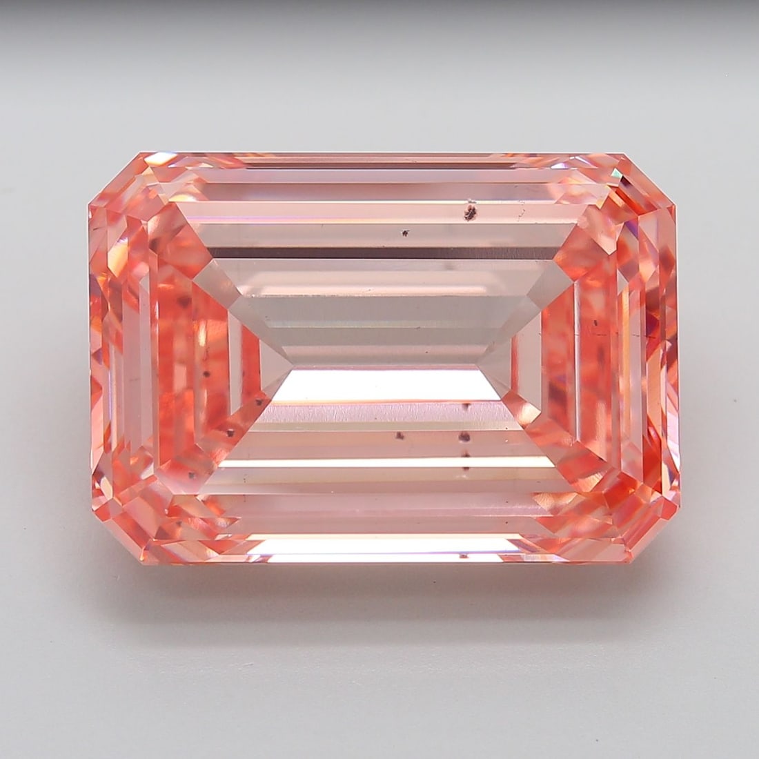 Loose Diamond - EMERALD 34.7ct Fancy Vivid Pink SI1: Loose Diamond - EMERALD 34.7ct Fancy Vivid Pink SI1 Source: This is a real non-mined Diamond that has been grown in a lab Shape: EMERALD Carats: 34.7 Color: Fancy Vivid Pink Certification: IGI Video: