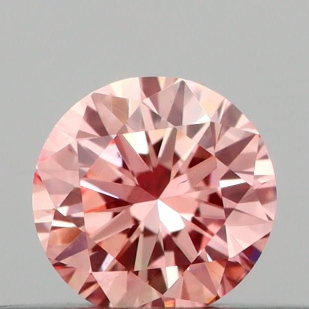 Loose Diamond - ROUND 0.2ct Fancy Vivid Pink VS2: Loose Diamond - ROUND 0.2ct Fancy Vivid Pink VS2 Source: This is a real non-mined Diamond that has been grown in a lab Shape: ROUND Carats: 0.2 Color: Fancy Vivid Pink Certification: IGI Video: