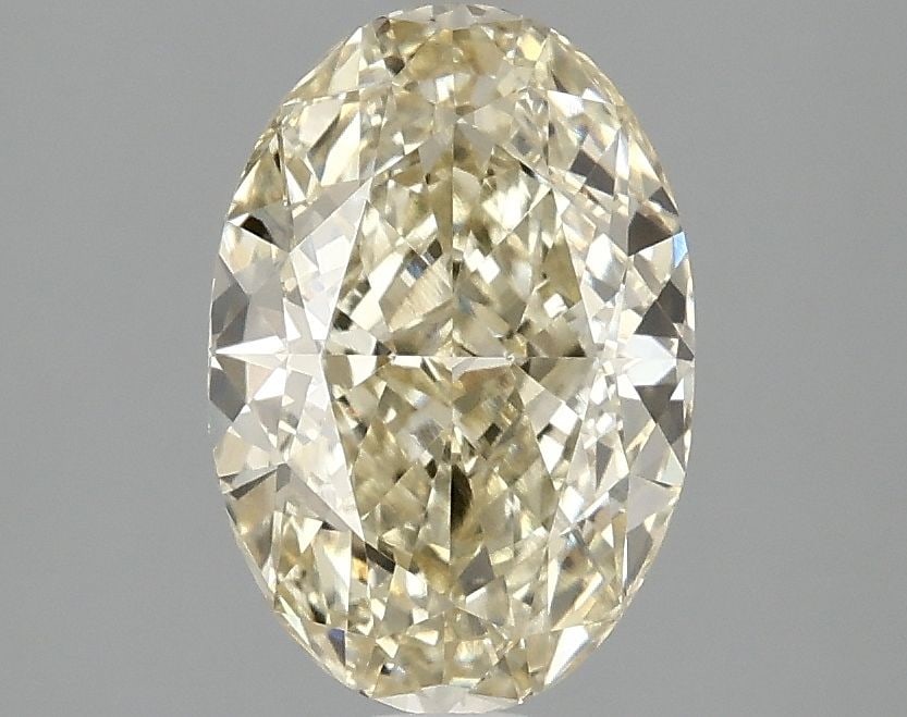 Loose Diamond - OVAL 2.1ct Fancy Yellow VVS2: Loose Diamond - OVAL 2.1ct Fancy Yellow VVS2 Source: This is a real non-mined Diamond that has been grown in a lab Shape: OVAL Carats: 2.1 Color: Fancy Yellow Certification: IGI Video: