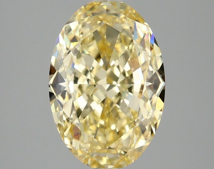 Loose Diamond - OVAL 3.1ct Fancy Intense Yellow VS1: Loose Diamond - OVAL 3.1ct Fancy Intense Yellow VS1 Source: This is a real non-mined Diamond that has been grown in a lab Shape: OVAL Carats: 3.1 Color: Fancy Intense Yellow Certification: IGI Video: