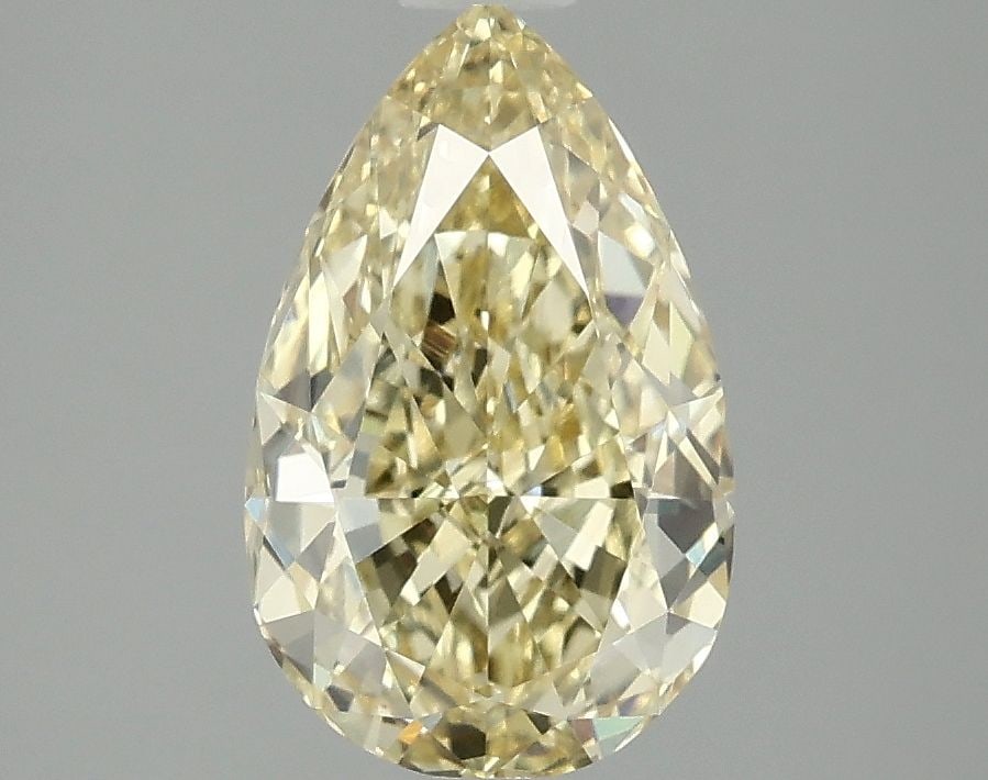 Loose Diamond - PEAR 2.1ct Fancy Vivid Yellow VVS2: Loose Diamond - PEAR 2.1ct Fancy Vivid Yellow VVS2 Source: This is a real non-mined Diamond that has been grown in a lab Shape: PEAR Carats: 2.1 Color: Fancy Vivid Yellow Certification: IGI Video: