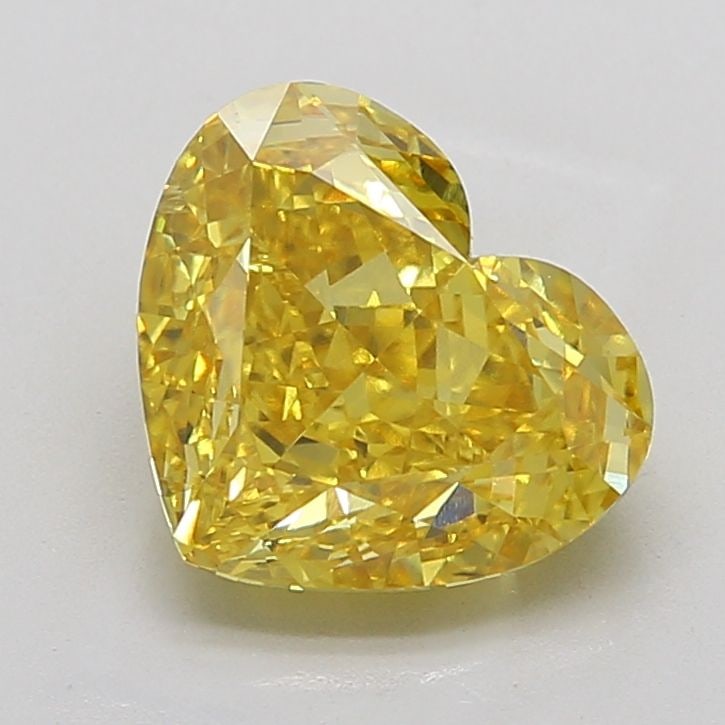 Loose Diamond - HEART 5.11ct Fancy Vivid Yellow VVS2: Loose Diamond - HEART 5.11ct Fancy Vivid Yellow VVS2 Source: This is a real non-mined Diamond that has been grown in a lab Shape: HEART Carats: 5.11 Color: Fancy Vivid Yellow Certification: IGI Video: