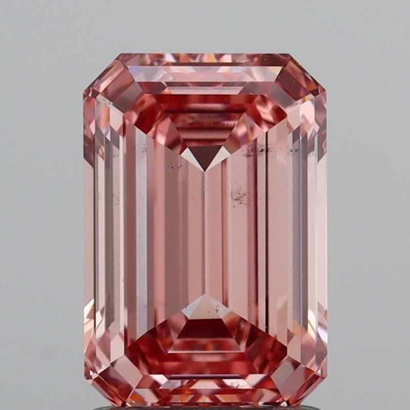 Loose Diamond - EMERALD 1.71ct Fancy Vivid Pink VS2: Loose Diamond - EMERALD 1.71ct Fancy Vivid Pink VS2 Source: This is a real non-mined Diamond that has been grown in a lab Shape: EMERALD Carats: 1.71 Color: Fancy Vivid Pink Certification: IGI Video: