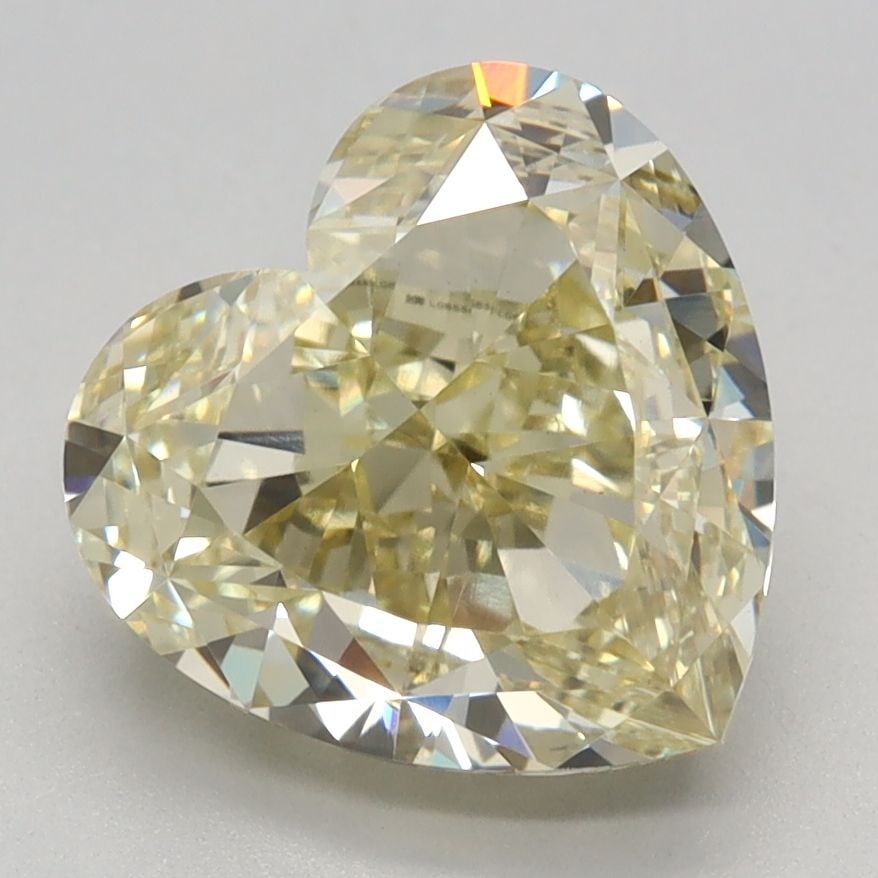 Loose Diamond - HEART 3.05ct Fancy Yellow VS1: Loose Diamond - HEART 3.05ct Fancy Yellow VS1 Source: This is a real non-mined Diamond that has been grown in a lab Shape: HEART Carats: 3.05 Color: Fancy Yellow Certification: IGI Video: