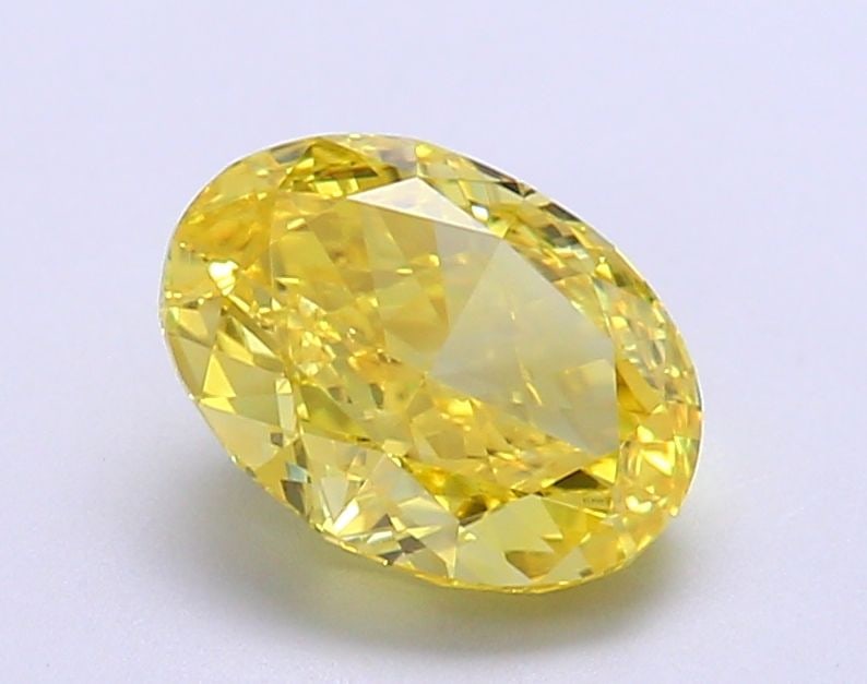 Loose Diamond - OVAL 2.13ct Fancy Vivid Yellow VS1: Loose Diamond - OVAL 2.13ct Fancy Vivid Yellow VS1 Source: This is a real non-mined Diamond that has been grown in a lab Shape: OVAL Carats: 2.13 Color: Fancy Vivid Yellow Certification: IGI Video:
