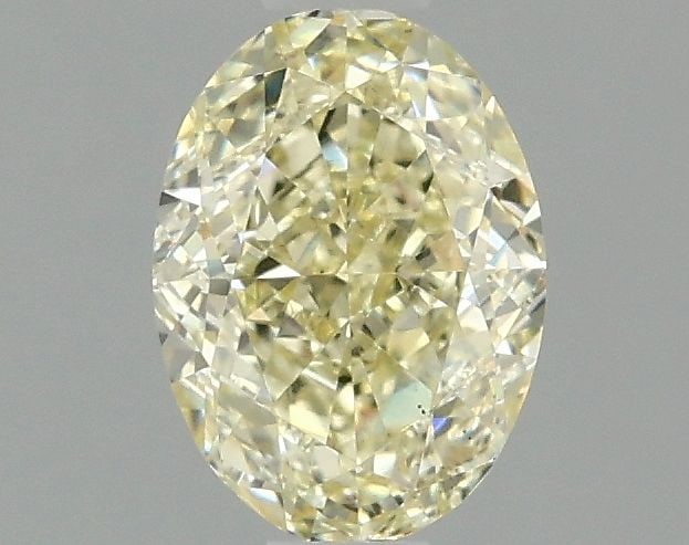 Loose Diamond - OVAL 1.09ct Fancy Yellow VS2: Loose Diamond - OVAL 1.09ct Fancy Yellow VS2 Source: This is a real non-mined Diamond that has been grown in a lab Shape: OVAL Carats: 1.09 Color: Fancy Yellow Certification: IGI Video: