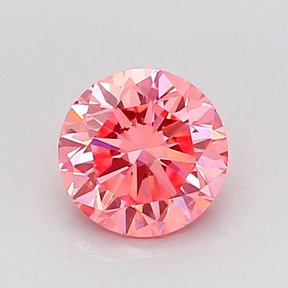Loose Diamond - ROUND 0.73ct Fancy Vivid Pink VS1: Loose Diamond - ROUND 0.73ct Fancy Vivid Pink VS1 Source: This is a real non-mined Diamond that has been grown in a lab Shape: ROUND Carats: 0.73 Color: Fancy Vivid Pink Certification: IGI Video: