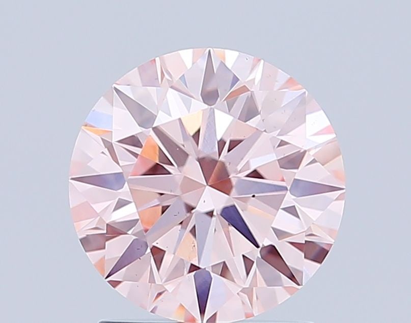 Ideal Loose Diamond - ROUND 1.57ct Fancy Pink VS2: Ideal Loose Diamond - ROUND 1.57ct Fancy Pink VS2 Source: This is a real non-mined Diamond that has been grown in a lab Shape: ROUND Carats: 1.57 Color: Fancy Pink Certification: IGI Video: