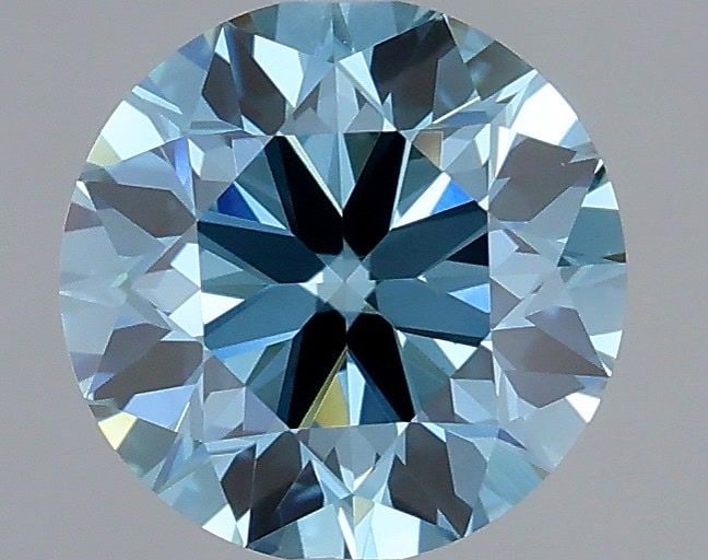 Ideal Loose Diamond - ROUND 1.0ct Fancy Vivid Blue VS1: Ideal Loose Diamond - ROUND 1.0ct Fancy Vivid Blue VS1 Source: This is a real non-mined Diamond that has been grown in a lab Shape: ROUND Carats: 1.0 Color: Fancy Vivid Blue Certification: IGI Video: