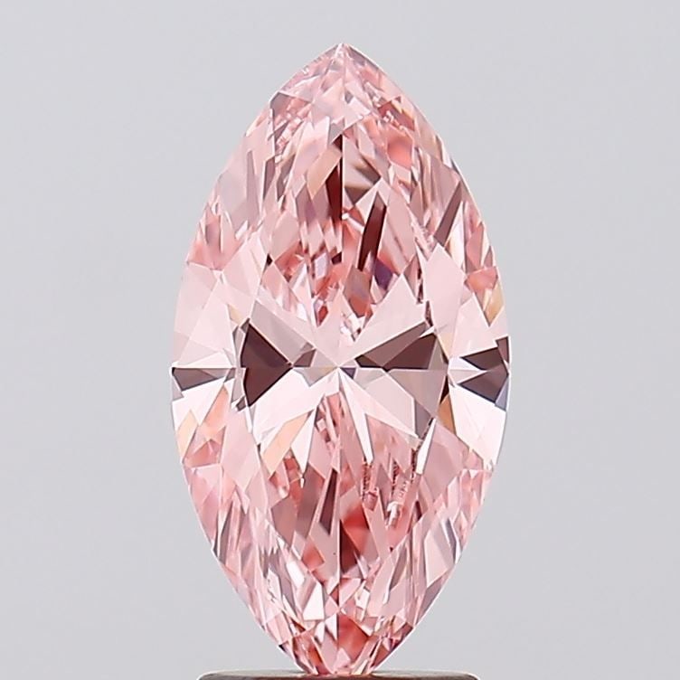 Loose Diamond - MARQUISE 2.5ct Fancy Vivid Pink VVS2: Loose Diamond - MARQUISE 2.5ct Fancy Vivid Pink VVS2 Source: This is a real non-mined Diamond that has been grown in a lab Shape: MARQUISE Carats: 2.5 Color: Fancy Vivid Pink Certification: IGI Video: