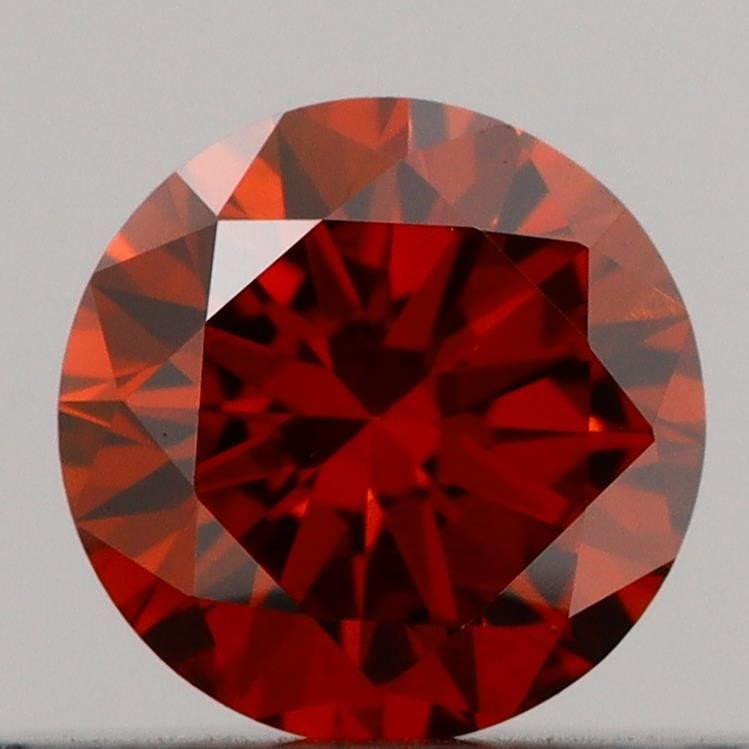 Loose Diamond - ROUND 0.26ct Fancy Deep Orange VVS2: Loose Diamond - ROUND 0.26ct Fancy Deep Orange VVS2 Source: This is a real non-mined Diamond that has been grown in a lab Shape: ROUND Carats: 0.26 Color: Fancy Deep Orange Certification: IGI Video:
