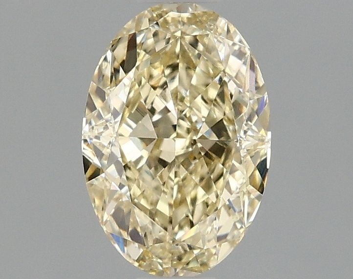 Loose Diamond - OVAL 1.1ct Fancy Yellow VS1: Loose Diamond - OVAL 1.1ct Fancy Yellow VS1 Source: This is a real non-mined Diamond that has been grown in a lab Shape: OVAL Carats: 1.1 Color: Fancy Yellow Certification: IGI Video: