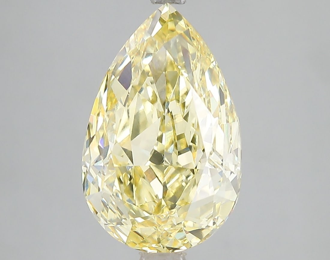 Loose Diamond - PEAR 5.04ct Fancy Vivid Yellow VS1: Loose Diamond - PEAR 5.04ct Fancy Vivid Yellow VS1 Source: This is a real non-mined Diamond that has been grown in a lab Shape: PEAR Carats: 5.04 Color: Fancy Vivid Yellow Certification: IGI Video: