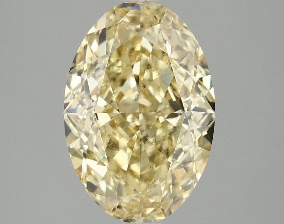 Loose Diamond - OVAL 3.1ct Fancy Intense Yellow VS1: Loose Diamond - OVAL 3.1ct Fancy Intense Yellow VS1 Source: This is a real non-mined Diamond that has been grown in a lab Shape: OVAL Carats: 3.1 Color: Fancy Intense Yellow Certification: IGI Video:
