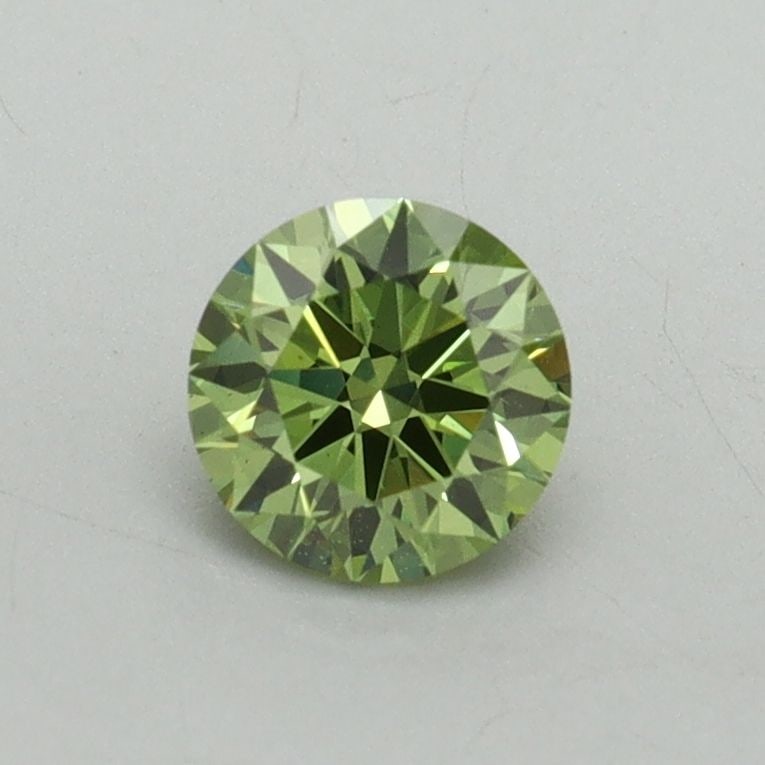 Ideal Loose Diamond - ROUND 0.56ct Fancy Vivid Green VS1: Ideal Loose Diamond - ROUND 0.56ct Fancy Vivid Green VS1 Source: This is a real non-mined Diamond that has been grown in a lab Shape: ROUND Carats: 0.56 Color: Fancy Vivid Green Certification: IGI Vid