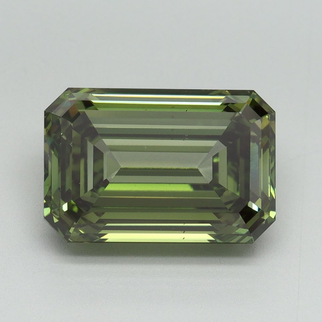 Loose Diamond - EMERALD 5.44ct Fancy Vivid Green VS2: Loose Diamond - EMERALD 5.44ct Fancy Vivid Green VS2 Source: This is a real non-mined Diamond that has been grown in a lab Shape: EMERALD Carats: 5.44 Color: Fancy Vivid Green Certification: IGI Video