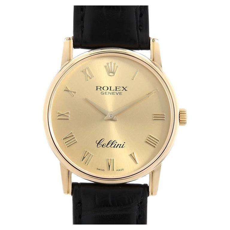 Rolex Cellini Ref 5116/8 Ladies Gold Dial Leather Watch With Papers 2004: Rolex Cellini Ref 5116/8 Ladies Gold Dial Leather Watch With Papers 2004 This Rolex Cellini wristwatch features a gold dial, leather bracelet, and is designed for ladies. The watch is part of the Cell