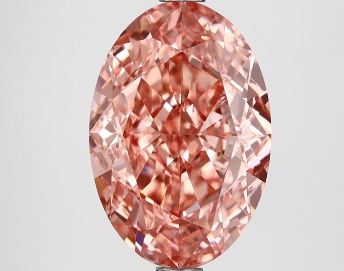 Loose Diamond - OVAL 4.14ct Fancy Vivid Pink VS1: Loose Diamond - OVAL 4.14ct Fancy Vivid Pink VS1 Source: This is a real non-mined Diamond that has been grown in a lab Shape: OVAL Carats: 4.14 Color: Fancy Vivid Pink Certification: IGI Video: