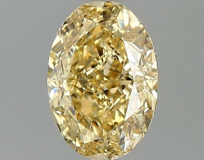 Loose Diamond - OVAL 1.57ct Fancy Vivid Yellow VS2: Loose Diamond - OVAL 1.57ct Fancy Vivid Yellow VS2 Source: This is a real non-mined Diamond that has been grown in a lab Shape: OVAL Carats: 1.57 Color: Fancy Vivid Yellow Certification: IGI Video: