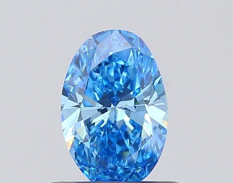 Loose Diamond - OVAL 0.57ct Fancy Vivid Blue VVS2: Loose Diamond - OVAL 0.57ct Fancy Vivid Blue VVS2 Source: This is a real non-mined Diamond that has been grown in a lab Shape: OVAL Carats: 0.57 Color: Fancy Vivid Blue Certification: IGI Video: