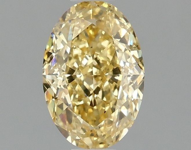 Loose Diamond - OVAL 1.1ct Fancy Vivid Yellow VS2: Loose Diamond - OVAL 1.1ct Fancy Vivid Yellow VS2 Source: This is a real non-mined Diamond that has been grown in a lab Shape: OVAL Carats: 1.1 Color: Fancy Vivid Yellow Certification: IGI Video: