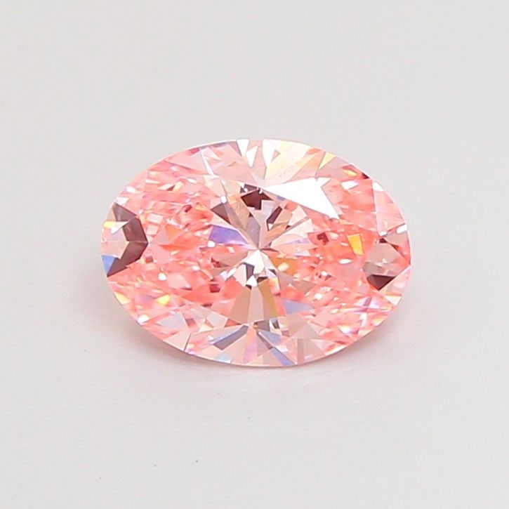 Loose Diamond - OVAL 1.1ct Fancy Vivid Pink VS2: Loose Diamond - OVAL 1.1ct Fancy Vivid Pink VS2 Source: This is a real non-mined Diamond that has been grown in a lab Shape: OVAL Carats: 1.1 Color: Fancy Vivid Pink Certification: IGI Video: