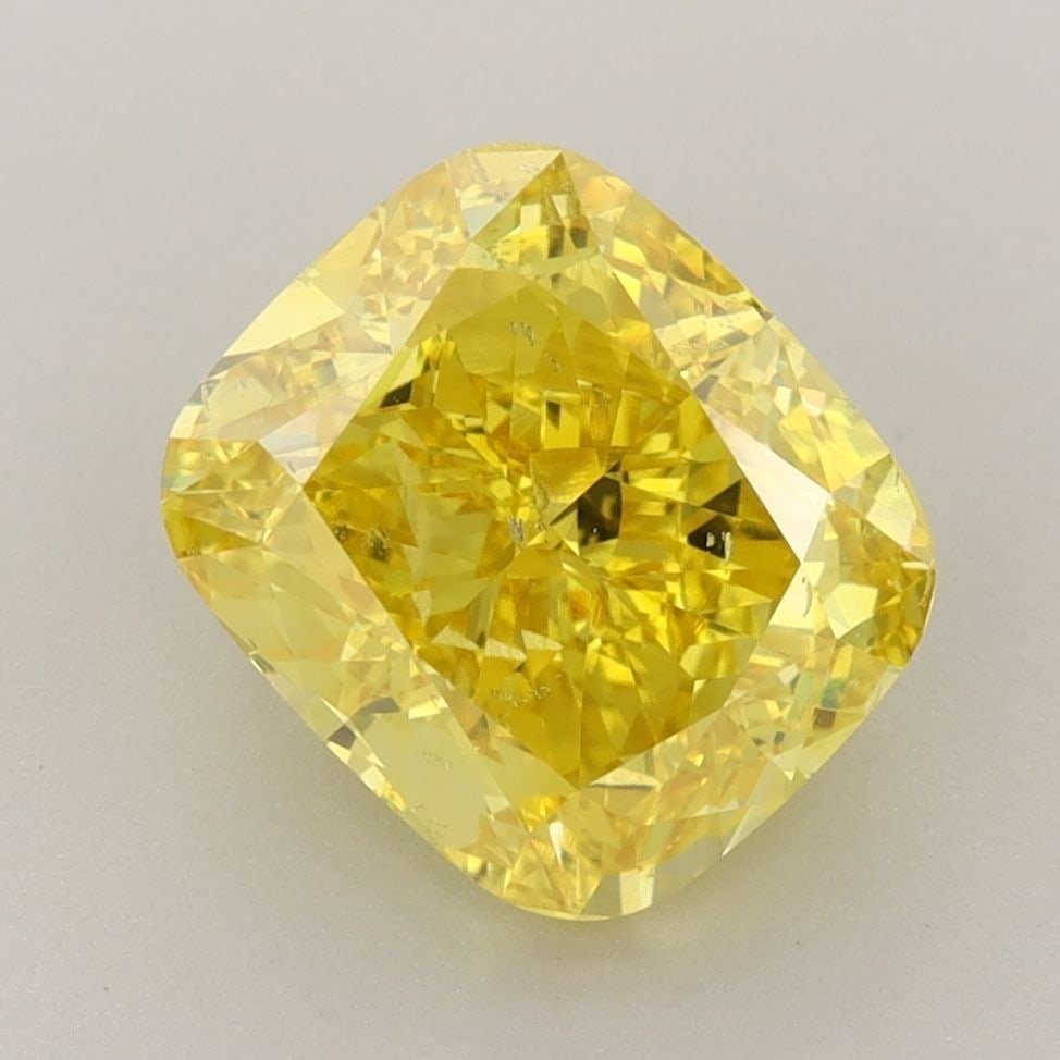 Loose Diamond - CUSHION BRILLIANT 4.01ct Fancy Vivid Yellow SI1: Loose Diamond - CUSHION BRILLIANT 4.01ct Fancy Vivid Yellow SI1 Source: This is a real non-mined Diamond that has been grown in a lab Shape: CUSHION BRILLIANT Carats: 4.01 Color: Fancy Vivid Yellow Ce