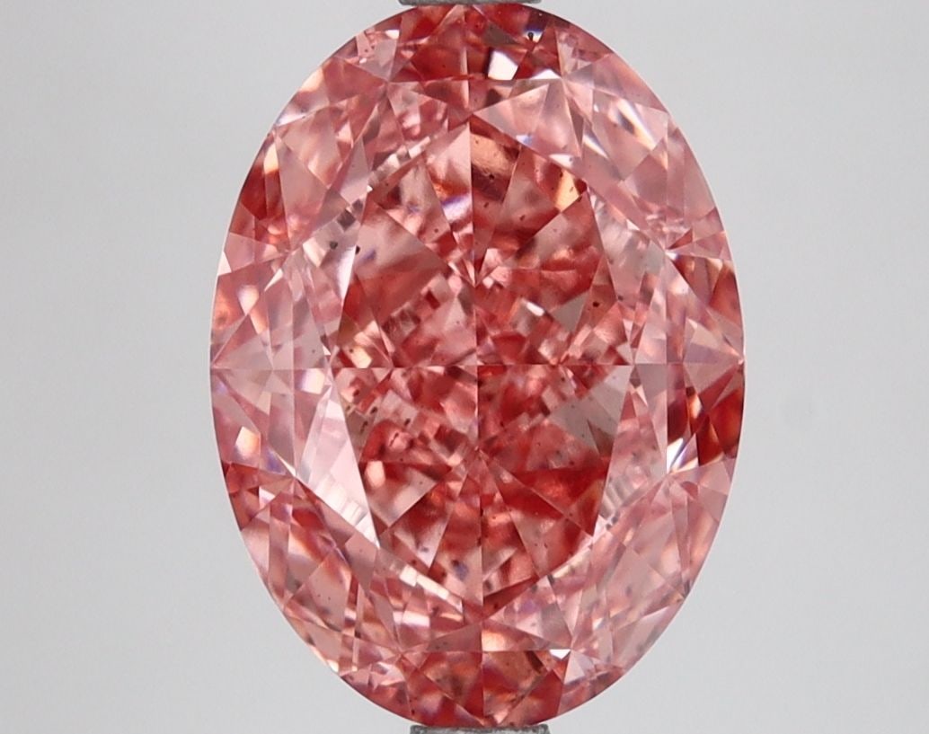 Loose Diamond - OVAL 4.16ct Fancy Vivid Pink VS2: Loose Diamond - OVAL 4.16ct Fancy Vivid Pink VS2 Source: This is a real non-mined Diamond that has been grown in a lab Shape: OVAL Carats: 4.16 Color: Fancy Vivid Pink Certification: IGI Video: