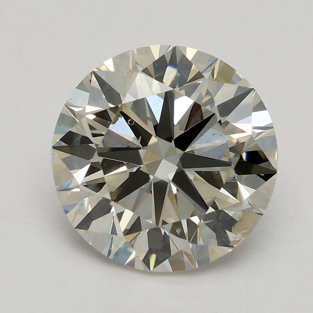 Loose Diamond - ROUND 2.52ct K SI2: Loose Diamond - ROUND 2.52ct K SI2 Source: This is a real non-mined Diamond that has been grown in a lab Shape: ROUND Carats: 2.52 Color: K Clarity: SI2 Certification: IGI Video: Video Link The