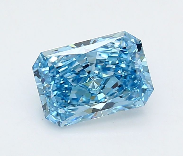 Loose Diamond - RADIANT 1.52ct Fancy Vivid Blue VVS2: Loose Diamond - RADIANT 1.52ct Fancy Vivid Blue VVS2 Source: This is a real non-mined Diamond that has been grown in a lab Shape: RADIANT Carats: 1.52 Color: Fancy Vivid Blue Certification: IGI Video: