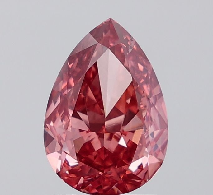 Loose Diamond - PEAR 2.12ct Fancy Vivid Pink SI1: Loose Diamond - PEAR 2.12ct Fancy Vivid Pink SI1 Source: This is a real non-mined Diamond that has been grown in a lab Shape: PEAR Carats: 2.12 Color: Fancy Vivid Pink Certification: IGI Video:
