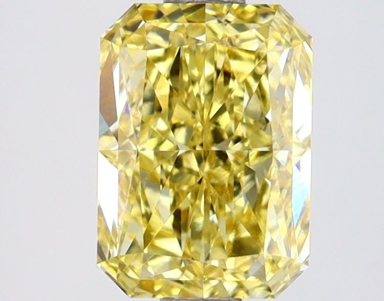Loose Diamond - RADIANT 1.59ct Fancy Vivid Yellow VVS2: Loose Diamond - RADIANT 1.59ct Fancy Vivid Yellow VVS2 Source: This is a real non-mined Diamond that has been grown in a lab Shape: RADIANT Carats: 1.59 Color: Fancy Vivid Yellow Certification: IGI Vi