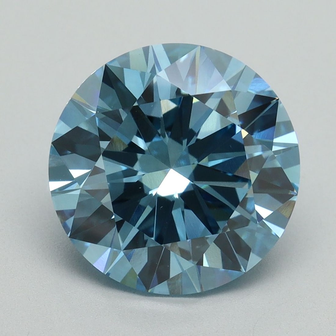 Loose Diamond - ROUND 5.02ct Fancy Vivid Blue VS1: Loose Diamond - ROUND 5.02ct Fancy Vivid Blue VS1 Source: This is a real non-mined Diamond that has been grown in a lab Shape: ROUND Carats: 5.02 Color: Fancy Vivid Blue Certification: IGI Video: