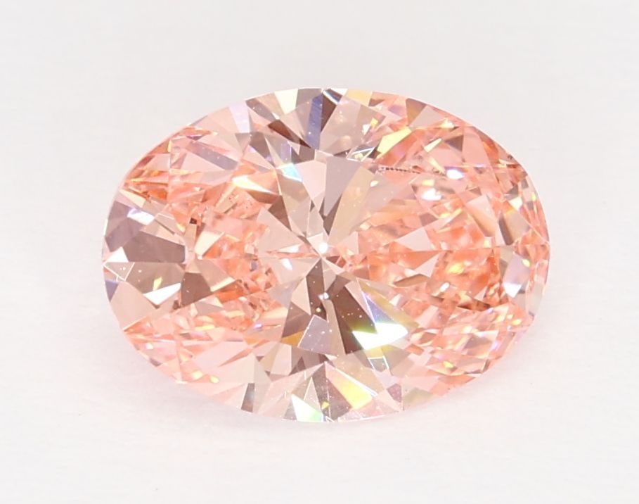 Loose Diamond - OVAL 1.0ct Fancy Vivid Pink VS1: Loose Diamond - OVAL 1.0ct Fancy Vivid Pink VS1 Source: This is a real non-mined Diamond that has been grown in a lab Shape: OVAL Carats: 1.0 Color: Fancy Vivid Pink Certification: IGI Video: Video