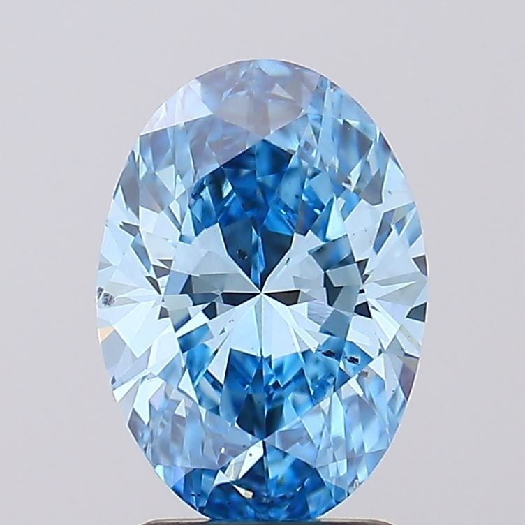 Loose Diamond - OVAL 1.95ct Fancy Vivid Blue VS2: Loose Diamond - OVAL 1.95ct Fancy Vivid Blue VS2 Source: This is a real non-mined Diamond that has been grown in a lab Shape: OVAL Carats: 1.95 Color: Fancy Vivid Blue Certification: IGI Video: