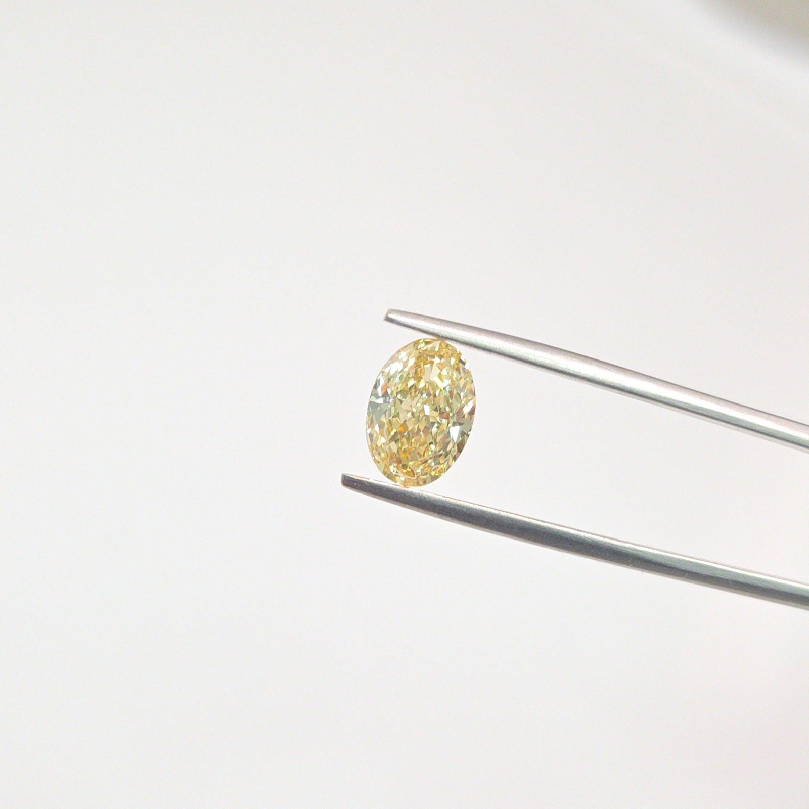 Loose Diamond - OVAL 2.08ct Fancy Yellow VVS2: Loose Diamond - OVAL 2.08ct Fancy Yellow VVS2 Source: This is a real non-mined Diamond that has been grown in a lab Shape: OVAL Carats: 2.08 Color: Fancy Yellow Certification: IGI Video: