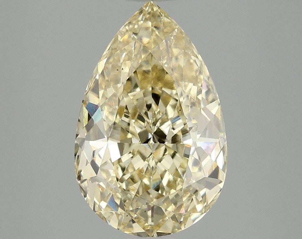Loose Diamond - PEAR 3.1ct Fancy Vivid Yellow VS2: Loose Diamond - PEAR 3.1ct Fancy Vivid Yellow VS2 Source: This is a real non-mined Diamond that has been grown in a lab Shape: PEAR Carats: 3.1 Color: Fancy Vivid Yellow Certification: IGI Video: