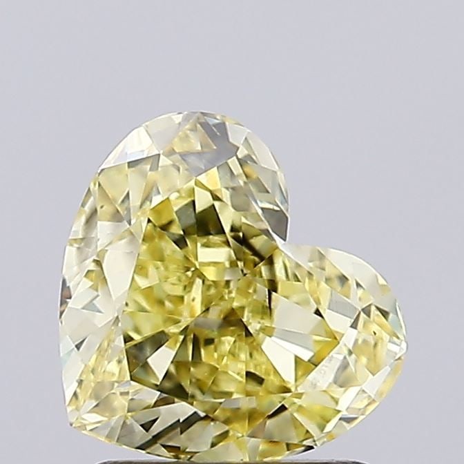 Loose Diamond - HEART 1.57ct Fancy Yellow VS1: Loose Diamond - HEART 1.57ct Fancy Yellow VS1 Source: This is a real non-mined Diamond that has been grown in a lab Shape: HEART Carats: 1.57 Color: Fancy Yellow Certification: IGI Video: