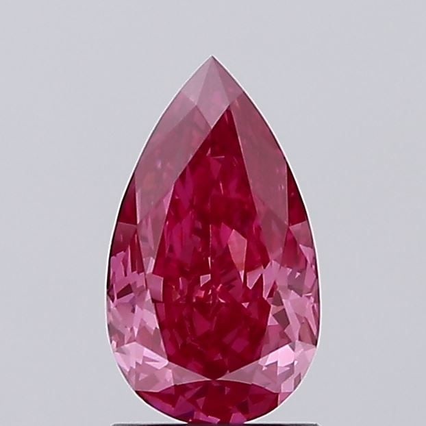 Loose Diamond - PEAR 1.4ct Fancy Vivid Pink VS1: Loose Diamond - PEAR 1.4ct Fancy Vivid Pink VS1 Source: This is a real non-mined Diamond that has been grown in a lab Shape: PEAR Carats: 1.4 Color: Fancy Vivid Pink Certification: IGI Video: