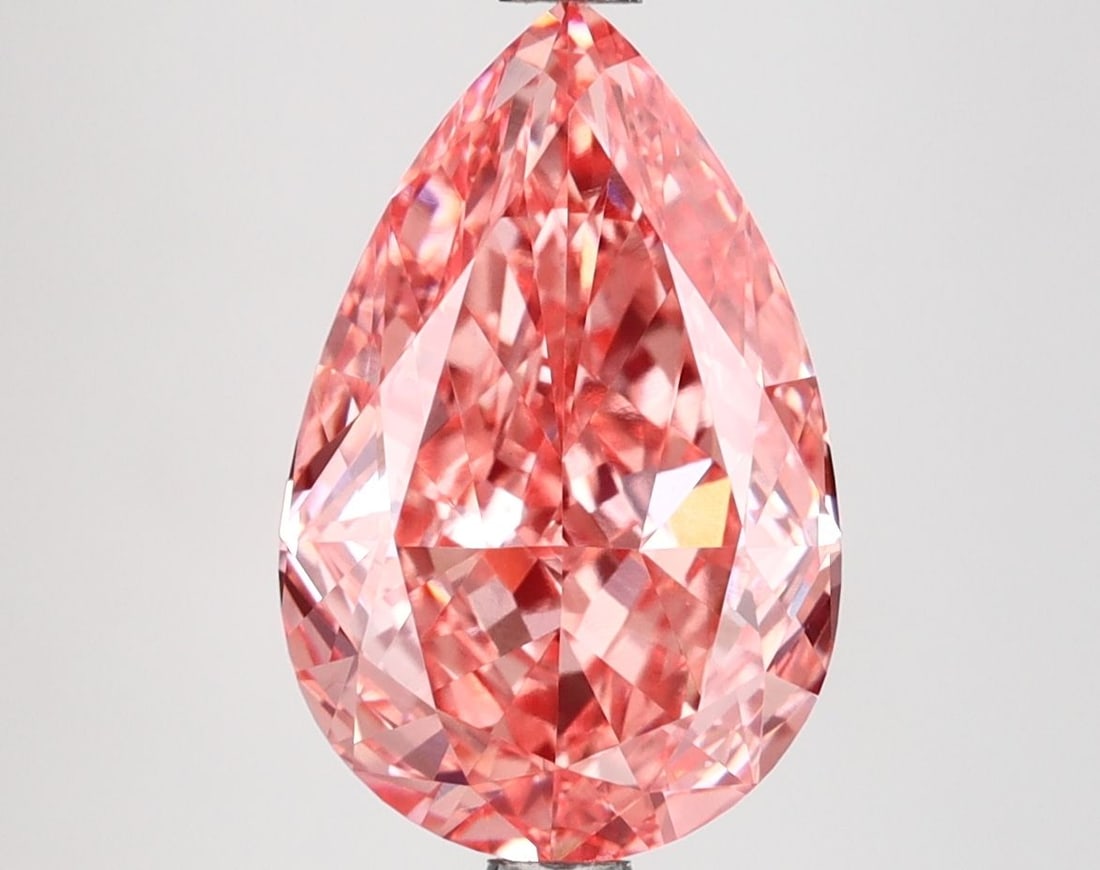 Loose Diamond - PEAR 3.7ct Fancy Vivid Pink VVS2: Loose Diamond - PEAR 3.7ct Fancy Vivid Pink VVS2 Source: This is a real non-mined Diamond that has been grown in a lab Shape: PEAR Carats: 3.7 Color: Fancy Vivid Pink Certification: IGI Video:
