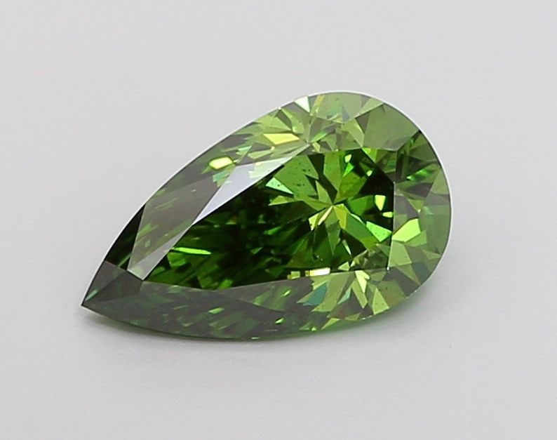 Loose Diamond - PEAR 1.97ct Fancy Vivid Green VS2: Loose Diamond - PEAR 1.97ct Fancy Vivid Green VS2 Source: This is a real non-mined Diamond that has been grown in a lab Shape: PEAR Carats: 1.97 Color: Fancy Vivid Green Certification: IGI Video:
