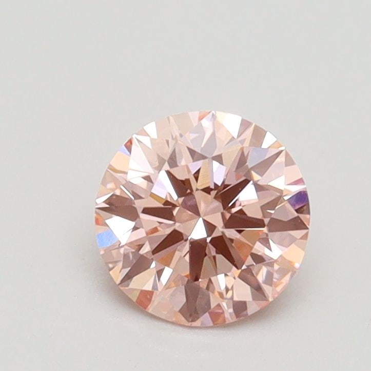 Ideal Loose Diamond - ROUND 0.65ct Fancy Intense Pink VS1: Ideal Loose Diamond - ROUND 0.65ct Fancy Intense Pink VS1 Source: This is a real non-mined Diamond that has been grown in a lab Shape: ROUND Carats: 0.65 Color: Fancy Intense Pink Certification: IGI V