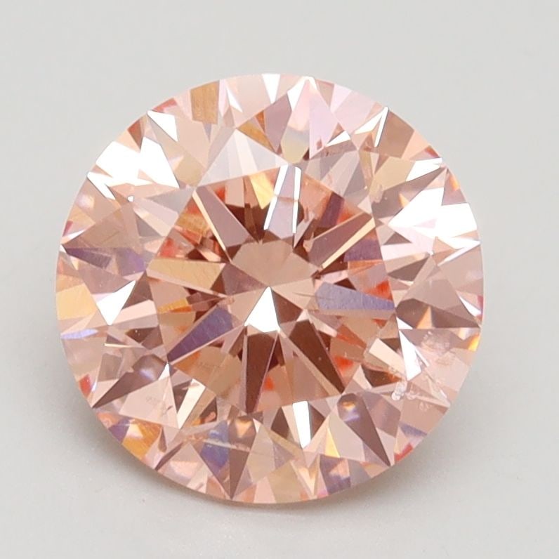Ideal Loose Diamond - ROUND 2.1ct Fancy Intense Pink SI2: Ideal Loose Diamond - ROUND 2.1ct Fancy Intense Pink SI2 Source: This is a real non-mined Diamond that has been grown in a lab Shape: ROUND Carats: 2.1 Color: Fancy Intense Pink Certification: IGI Vid